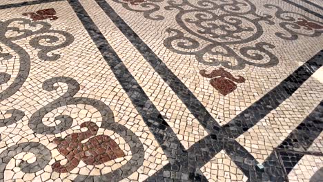 Exploring-the-streets-adorned-with-historic-pavement-art-in-Portugal
