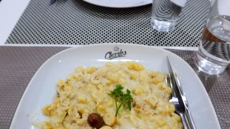 Closeup-point-of-view-shot-of-Bacalhau-a-Bras,-a-typical-Portuguese-dish-of-Aveiro