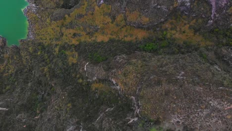 Volcanic-Crater-Lake,-Aerial-Landscape-View-of-Laguna-De-Quilotoa-in-Ecuador,-Top-Down-View