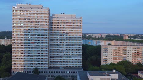 Smooth-aerial-top-view-flight-prefabricated-housing-complex,-Panel-system-building-Berlin-Marzahn-Germany-Europe-summer-23