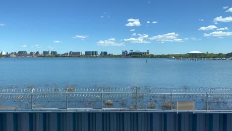 View-of-Queens,-New-York,-from-Laguardia-Airport-Across-the-Bay,-on-a-Beautiful,-Sunny-Afternoon