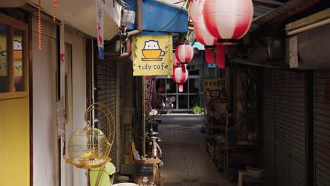 Tiny-Shopping-and-Cafe-Alleyway-in-Japan,-Nipponbashi-Osaka