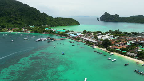 Exotic-township-of-Koh-in-Phi-Phi-island,-aerial-drone-view