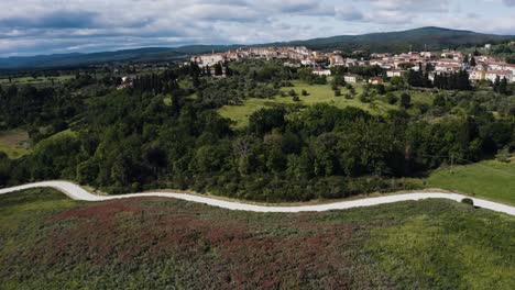 Aerial-view-over-the-main-road-leading-to-Rapolano-Terme-in-Italy's-wine-country