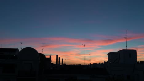 Beautiful-soft-color-palette-Summer-sunset-seen-in-downtown-Madrid,-Spain