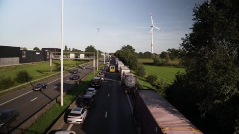 Ambulance-rush-to-accident-scene-on-Belgium-highway,-static-view