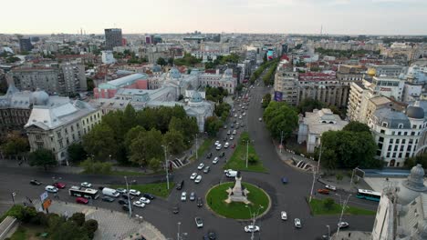 University-Square-in-Bucharest,-Romania:-A-Drone’s-View-Of-Traffic-In-A-Roundabout