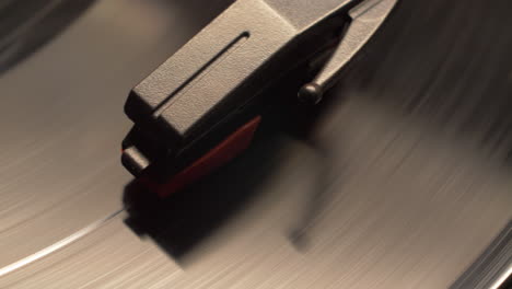 slider-move-on-a-spinning-vintage-vinyl-music-album-playing-on-a-retro-record-player