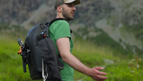 Portrait-Of-A-Hiker-With-Backpack-Trekking-On-Mountain-Trails