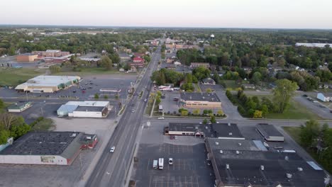Clare-township-with-moving-cars,-aerial-drone-view
