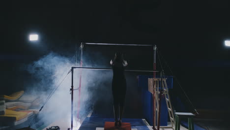 performance-in-gymnastics-female-gymnast-in-uneven-bars.