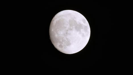 Clean-white-grey-supermoon-full-moon-with-craters-and-lines-visible-on-surface