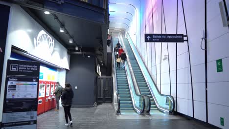 Truck-right-panoramic-view-of-Santiago-Metro's-self-management-machines-with-deactivated-or-damaged-escalators,-Santiago-Chile