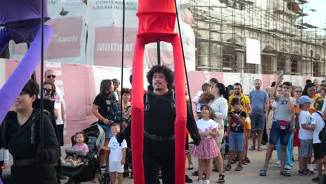 a-puppet-worker-dancing-in-the-city-of-Constanta,-Romania
