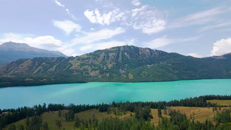 Aerial-establishing-dolly-of-stunning-kanas-lake,-xinjiang-china-ecopark,-midday