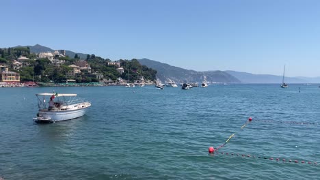 Picturesque-views-of-boats-mooring-and-the-movement-of-gentle-waves-in-Santa-Margherita-Ligure,-Italy
