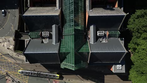 Aerial-drone-flight-with-a-birdseye-view-of-the-rooftop-of-Manchester-Crown-Court
