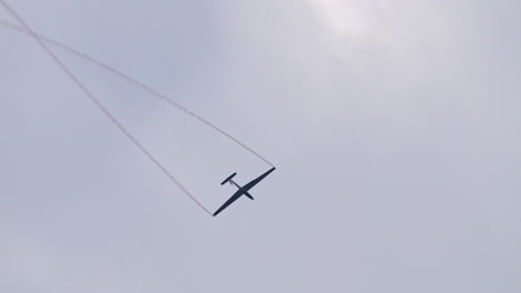 Glider-aircraft-doing-impressive-spin-maneuvers-during-aerobatics-flight
