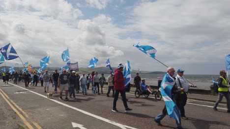 Wide-shot-of-people-marching-for-Scottish-Independence-in-Ayr
