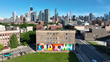 Aerial-reveal-of-Old-Town-Chicago-mural-on-historic-building