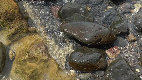 Stable-view,-clear-stream-running-through-stones