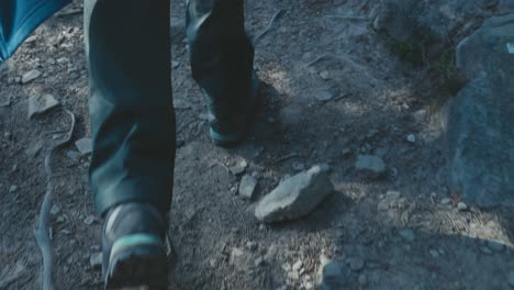 Close-up-footage-of-hiking-boots,-trekking-in-the-forrest-of-Jasper-National-Park-in-Canada