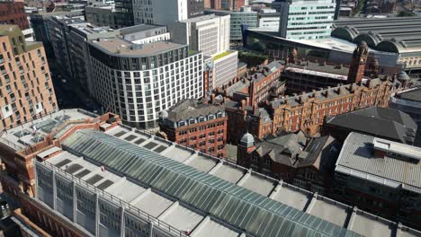 Aerial-drone-flight-over-London-Road-Fire-Station-Building-to-slowly-reveal-the-Manchester-Astronomical-Society-building