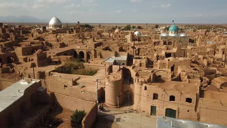 wonderful-ancient-architecture-design-in-historical-city-of-aqda-in-Yazd-in-Iran-town-in-castle-adobe-houses-mud-brick-structure-clay-building-travel-to-history-and-frozen-ruins-of-civilization-iran