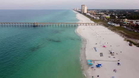 Panama-city-beach-fishing-pier-and-beach-aerial-coastal-view-with-empty-beach-on-early-morning