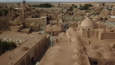 Qanat-water-reservoir-bazaar-local-market-clay-adobe-house-in-the-material-of-desert-village-architecture-design-in-middle-east-Asia-Cobble-stone-design-of-down-town-for-walking-activities-in-Travel