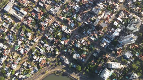 Aerial-view-of-the-coastal-city-of-Posadas-Misiones-Argentina,-drone-shot-of-densely-populated-coastal-city