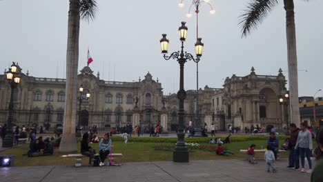 Panorama-Of-Crowded-Plaza-de-Armas-At-Dusk-In-Lima,-Peru