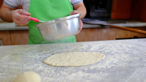chef-is-preparing-pita-dough