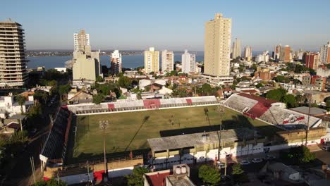 Aerial-view-of-a-soccer-stadium-in-Argentina-with-clear-skies