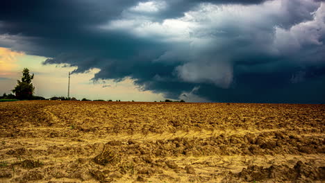 Arable-soil-and-formation-of-epic-storm,-time-lapse-view