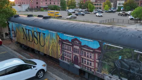 North-Dakota-State-University-mural-on-train-car-in-downtown-Fargo,-ND