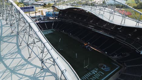 4K-Roof-Top-Dome-Drone-Shot-of-IG-Investors-Group-Field-University-of-Manitoba-Winnipeg-Blue-Bombers-Football-and-Soccer-Concert-Stadium-Arena-in-Canada
