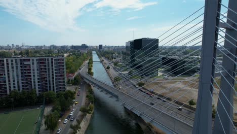 Aerial-View-Of-Ciurel-Bridge-In-Bucharest,-Romania-On-A-Sunny-Day-With-A-Blue-Sky