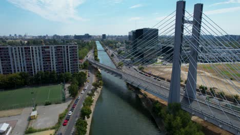 Aerial-View-Of-Ciurel-Bridge-In-Bucharest,-Romania-On-A-Sunny-Day-With-A-Blue-Sky