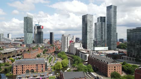 Aerial-drone-flight-over-Castlefield-Quays-in-Manchester-City-Centre-with-a-view-of-Elizabeth-Square-and-Beetham-Tower