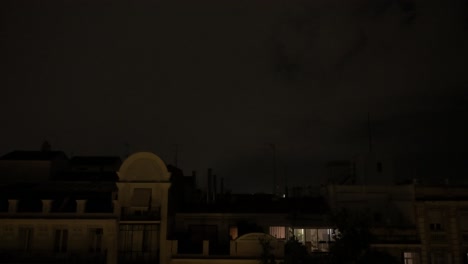 Streak-of-lightning-flashes-in-the-night-sky-in-Madrid,-Spain