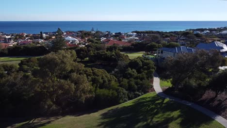 Indian-Ocean-Views-From-Tree-Lined-Park,-Mindarie-Perth