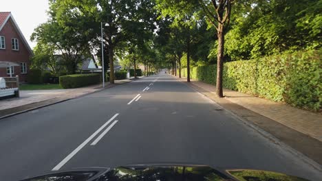 POV-driving-in-a-suburban-neighborhood-in-Odense,-Denmark