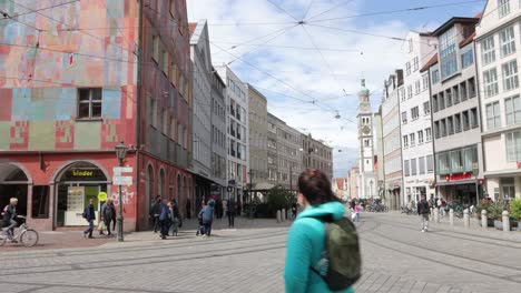 City-Centre-Street-Scene-With-People-Walking-At-Moritzplatz-In-Augsburg,-Bavaria,-Germany,-Europe