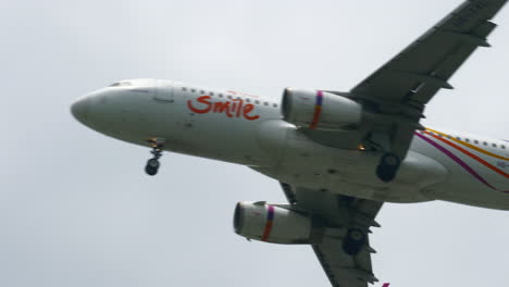 Thai-Smile-Airways-prepares-for-Landing-at-Suvarnabhumi-Airport,-Thailand