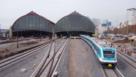 Aerial-pan-of-still-train-and-tracks-at-Retiro-station-in-Buenos-Aires