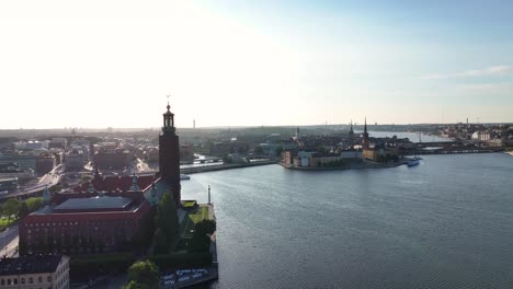 Amazing-aerial-cityscape-of-historic-old-town-and-city-hall-tower-on-riverfront