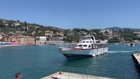 Ferry-boats-navigating-towards-the-pier-of-Santa-Margherita-Ligure,-Italy
