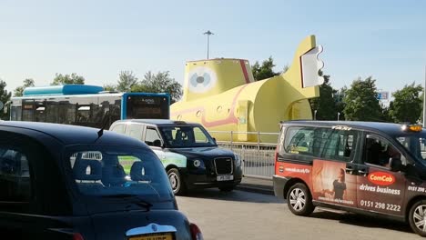 Beetles-yellow-submarine-display-outside-Liverpool-John-Lennon-airport-taxi-rank-pickup-service