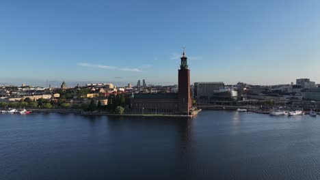 Drone-flying-to-famous-tower-of-Stockholm-town-hall